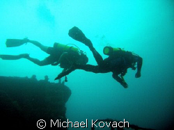Divers on the Duane out of Key Largo by Michael Kovach 